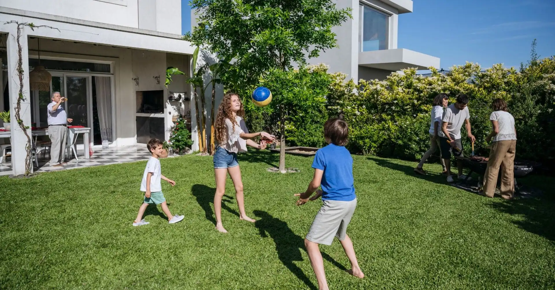 Family enjoying their mosquito-free backyard in Rhode Island